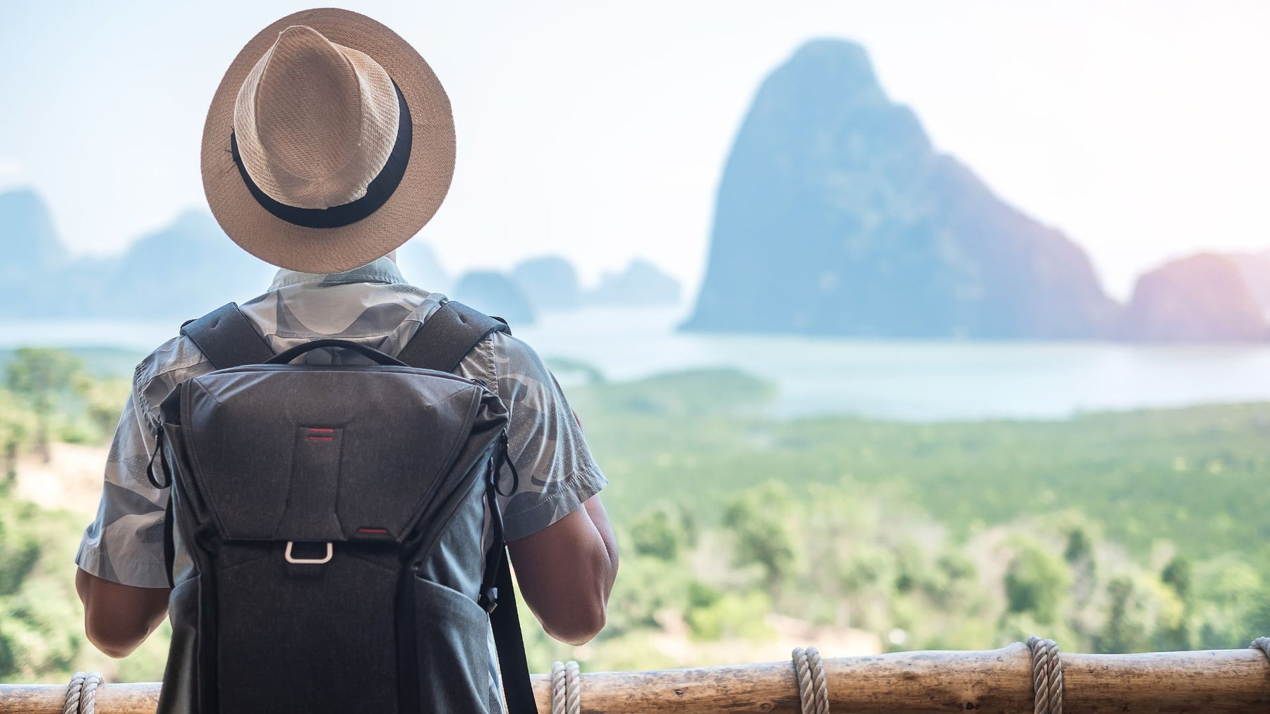 A traveler man viewing the mountains