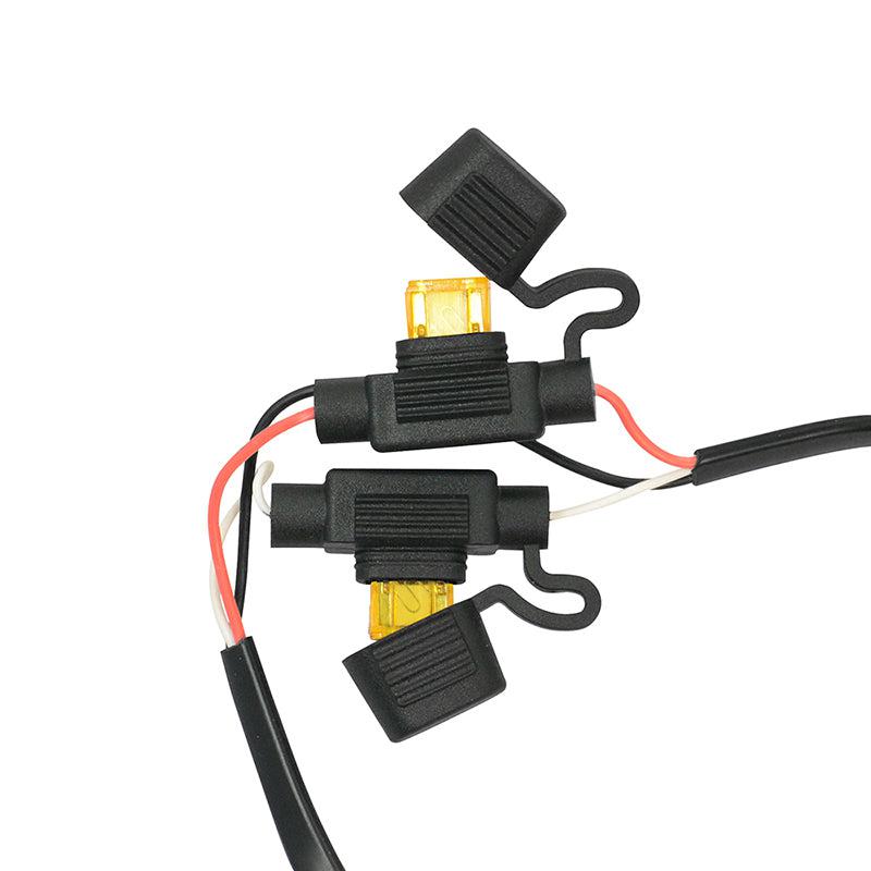 Two black inline fuse holders with yellow fuses are shown with red and white wires attached, designed for hardwiring the 30W 2-Port Quick Charge 3.0 and USB-A Car Fixed Install Charger, with open protective caps on a white background.