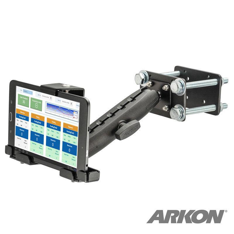 The LockVise™ Metal Locking Forklift Front Guard Tablet Mount with 7.25 Shaft, shown holding a tablet with a colorful display, is attached to a metal clamp bracket—an ideal warehouse mounting solution. Arkon logo at bottom right.