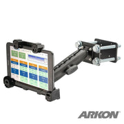 The LockVise™ Locking Forklift Front Guard Tablet Mount with 7.25 Shaft, shown in black, clamps securely to a metal surface and grips a tablet displaying a colorful dashboard. The ARKON logo is visible in the bottom right corner.