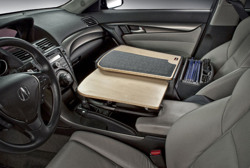 The front car interior features the AutoExec GripMaster Car Desk over the passenger seat, complemented by a black mat and a file organizer in the center console to create an efficient mobile workstation. For enhanced productivity, an Arkon Mounts Slim-Grip® Ultra Pro Drill-Base Tablet Mount is also included.
