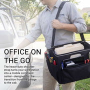 A man carries a Portable Crate Workstation with Apron Organizer—filled with office supplies, folders, and a tablet—as he reaches for a car door; text highlights this innovative workstation as the ideal mobile solution for professionals on the go.