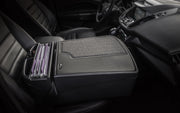 An Arkon Mounts AutoExec GripMaster Efficiency Car Desk positioned between the driver’s and passenger seat offers a spacious center console organizer that neatly holds multiple file folders, transforming your car interior into an organized mobile workstation or convenient desk on the go.