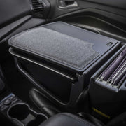 A vehicle’s front passenger seat equipped with an Arkon Mounts AutoExec GripMaster Car Desk, offering a textured writing surface, file folders, and storage compartments—creating the ideal mobile workstation.