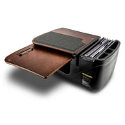The Arkon Mounts AutoExec GripMaster Car Desk is a portable workstation designed for professionals on the go, featuring a brown fold-out writing surface, black padded area, document slots with folders, and multiple compartments to organize office supplies.