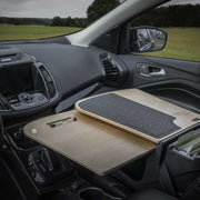 The Arkon Mounts AutoExec GripMaster Car Desk features a clipboard surface and attaches to the passenger seat, transforming it into a mobile workstation with file folder storage below.