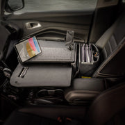 Transform your car passenger seat into a mobile workstation with the AutoExec GripMaster Car Desk, featuring Mega Grip™ and Slim-Grip® Ultra Pro Drill-Base Mounts for secure tablet placement, plus dedicated spots for a clipboard, phone, and file folders—keeping your setup organized and ideal for working on the go.