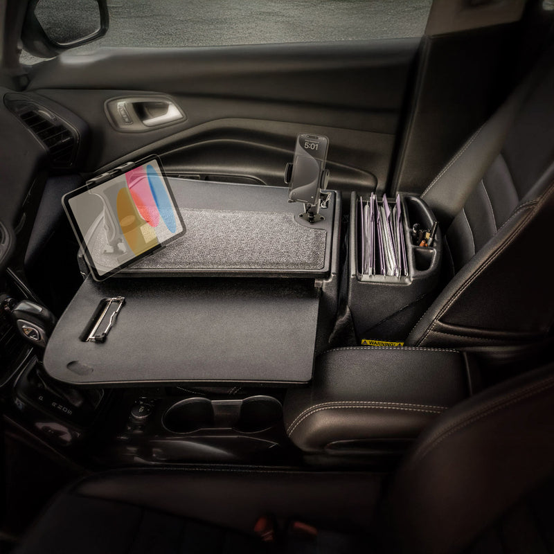 Transform your car passenger seat into a mobile workstation with the AutoExec GripMaster Car Desk, featuring Mega Grip™ and Slim-Grip® Ultra Pro Drill-Base Mounts for secure tablet placement, plus dedicated spots for a clipboard, phone, and file folders—keeping your setup organized and ideal for working on the go.