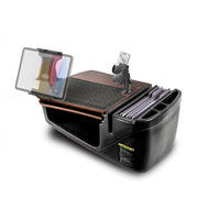 The AutoExec GripMaster Car Desk with Mega Grip™ and Slim-Grip® Ultra Pro Drill-Base Mounts is a black, portable mobile workstation featuring a spacious writing surface, file folder slots, side storage compartments, an integrated clipboard, and a convenient tablet holder—ideal for organizing paperwork and working efficiently on the go.