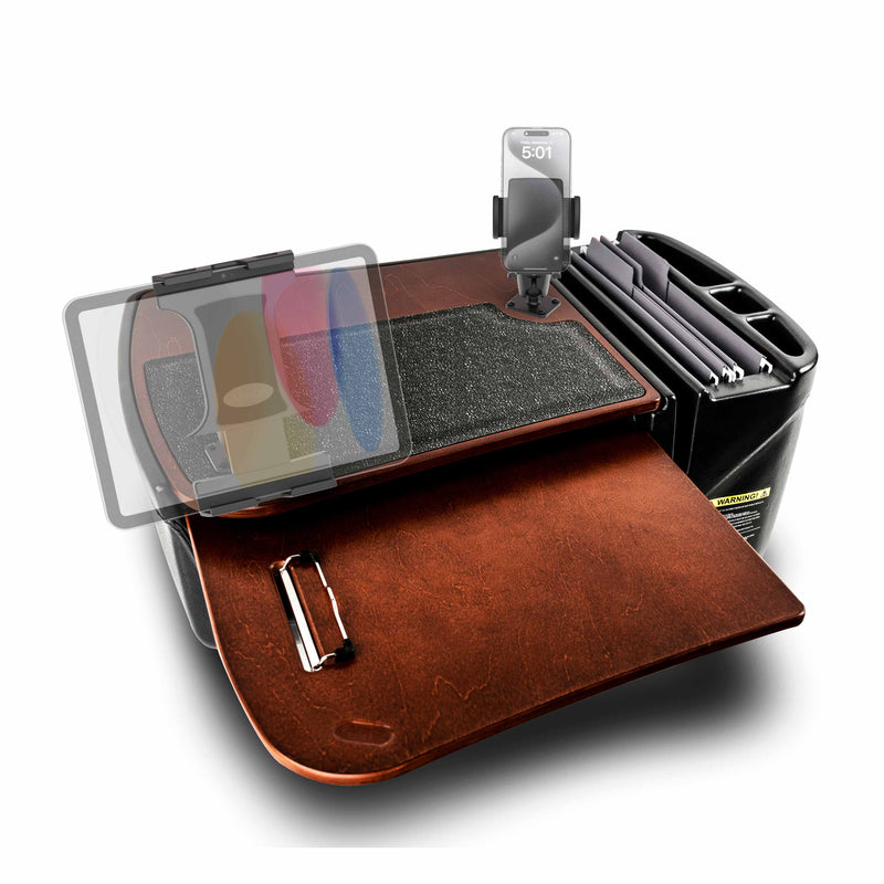 The AutoExec GripMaster Car Desk with Mega Grip™ and Slim-Grip® Ultra Pro Drill-Base Mounts features a brown wood finish, phone holder, file slots, pen slot, tablet holder, and a removable privacy screen. It is designed to fit over a car seat for an efficient mobile workstation experience.