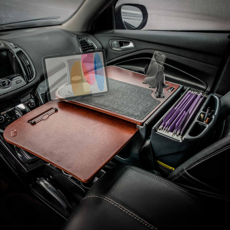 The AutoExec GripMaster Car Desk with Mega Grip™ and Slim-Grip® Ultra Pro Drill-Base Mounts transforms your car’s front passenger seat into a versatile mobile workstation, featuring a secure tablet holder, clipboard, mouse pad, and an organizer for file folders—perfect for working efficiently on the go.