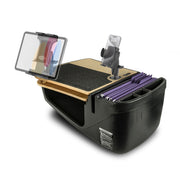 The AutoExec GripMaster Car Desk with Mega Grip™ and Slim-Grip® Ultra Pro Drill-Base Mounts features a black design with a tan clipboard, digital device holder, dedicated compartments for folders, cup holders, and a mounted tablet holder. This versatile car desk is engineered to fit securely in your car seat, providing professionals on-the-go with the ultimate mobile workstation.