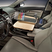 The AutoExec GripMaster Car Desk with Mega Grip™ and Slim-Grip® Ultra Pro Drill-Base Mounts is installed over the passenger seat, providing a stable surface that extends from the dashboard to the seat. This versatile desk holds a phone securely and keeps office supplies organized, making it the ideal mobile workstation for productivity while on the road.