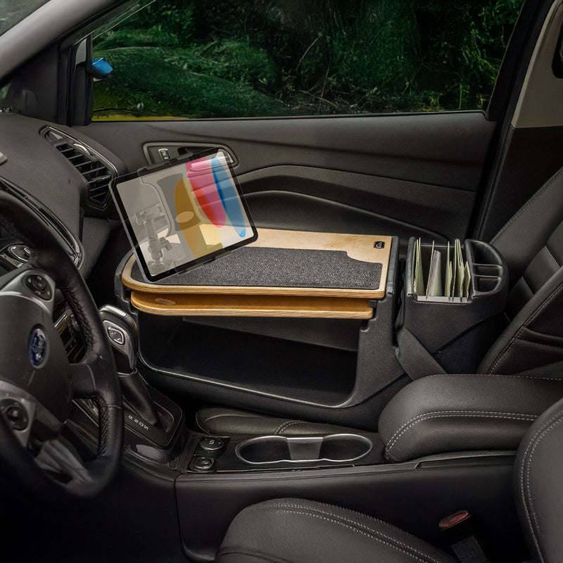 The AutoExec GripMaster Car Desk with Slim-Grip® Ultra Pro Multi-Angle Mount by Arkon Mounts is installed on the passenger seat, providing a convenient mobile office workspace with an integrated tablet holder and file organizer.