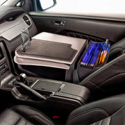 The AutoExec GripMaster Car Desk with Mega Grip™ Drill-Base Mount transforms your car’s front seat into a mobile office workstation, featuring a built-in writing pad, the secure Mega Grip phone mount, and organized spaces for files and pens—ensuring efficient productivity on the go.