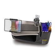 The AutoExec GripMaster Car Desk with Mega Grip™ and Slim-Grip® Ultra Pro Drill-Base Mounts is a portable mobile workstation designed for on-the-go office needs, featuring mounts for tablets and phones, a file organizer with blue folders, dedicated pen slots to hold pens and scissors, and a stable surface for writing or device use.