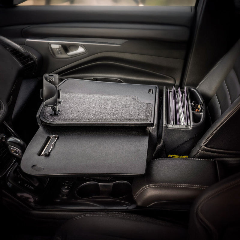 The AutoExec GripMaster Car Desk with Mega Grip™ Drill-Base Mount transforms your front passenger seat into an efficient mobile office workstation, offering a sturdy writing surface, integrated clipboard, built-in file organizers, and handy pen holders—all expertly designed for productive work on the go.