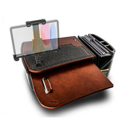 The AutoExec GripMaster Car Desk with LockVise™ Locking Tablet Holder and Multi-Angle Mount features a brown wood finish, phone holder, black organizer compartments, felt writing surface, clipboard, and a secure locking tablet holder—ideal for creating a safe and efficient mobile workstation on the go.