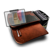 Transform any vehicle into a mobile office with the AutoExec GripMaster Car Desk featuring Arkon Mounts’ Slim-Grip® Ultra Pro Multi-Angle Mount. This portable desk boasts a sleek brown surface, integrated mouse pad, and document organizer. A translucent diagram overlays part of the desk, showcasing convenient storage compartments, accessory sections, and a dedicated tablet holder for improved productivity on the go.