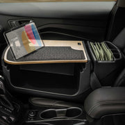 Transform your car interior into a functional mobile office with the AutoExec GripMaster Efficiency Car Desk by Arkon Mounts, featuring a built-in Slim-Grip® Ultra Pro Multi-Angle Mount for your tablet, a textured working surface, and an integrated folder organizer holding several green files between the seats.