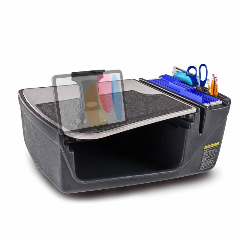 The GripMaster Efficiency Car Desk with Slim-Grip® Ultra Pro Drill-Base Mount by Arkon Mounts offers a portable workstation with an open lid, featuring a tablet holder on top and neatly arranged office supplies like scissors, pens, and folders, along with a flat work surface for added convenience.
