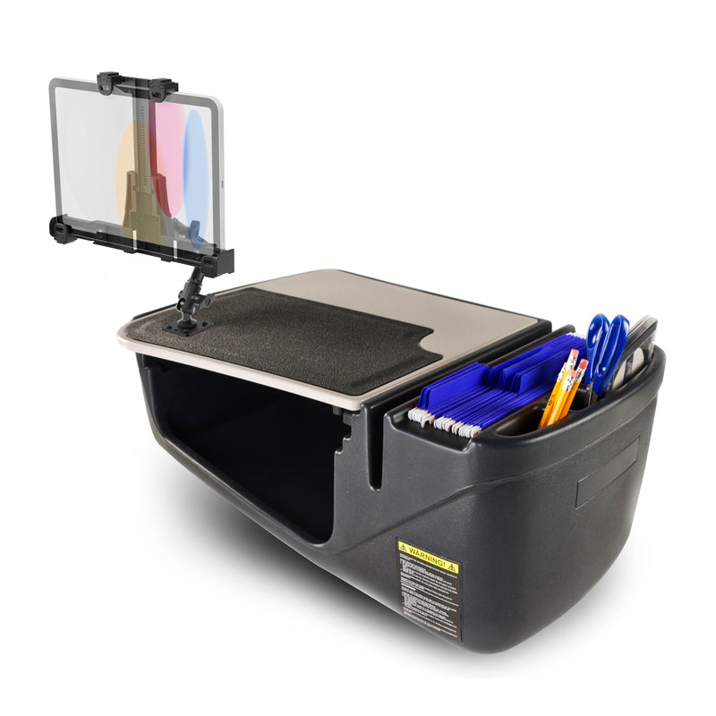 Featuring the AutoExec GripMaster Efficiency Car Desk, this black lap desk is equipped with a LockVise® locking tablet holder and multi-angle mount for secure device use. Its spacious storage compartment conveniently holds folders, pens, and scissors, while a clear mounted screen with color strips is attached to the side. With a cushioned writing surface on top, this versatile car desk transforms any space into an efficient mobile workstation—ideal for work on the go or as a practical car office solution.
