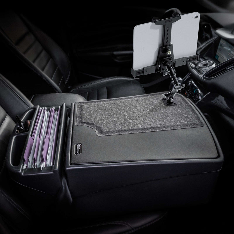 The AutoExec GripMaster Efficiency Car Desk with LockVise® Locking Tablet Holder and Multi-Angle Mount features a secure tablet holder on the center console, side compartments for organizing folders, and a textured work surface—all designed to create an efficient mobile workstation.