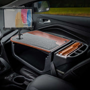The AutoExec GripMaster Efficiency Car Desk with a LockVise® Locking Tablet Holder and Multi-Angle Mount transforms the car’s front passenger seat into a fully functional mobile workstation, featuring a felt work surface, built-in file organizer for manila folders, and a secure tablet holder.