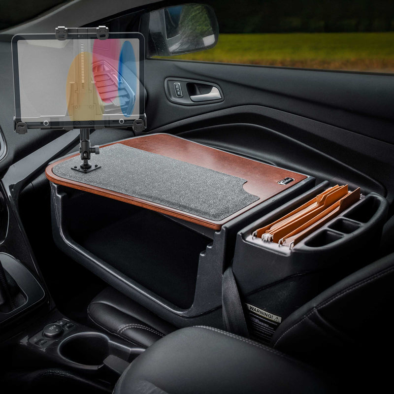 The AutoExec GripMaster Efficiency Car Desk with a LockVise® Locking Tablet Holder and Multi-Angle Mount transforms the car’s front passenger seat into a fully functional mobile workstation, featuring a felt work surface, built-in file organizer for manila folders, and a secure tablet holder.