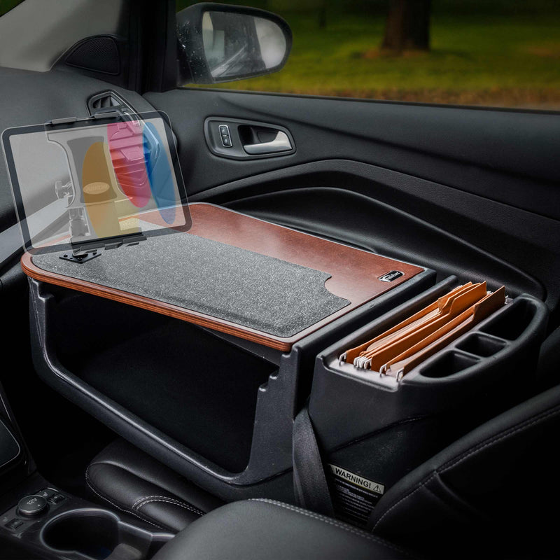 Transform your passenger seat into a productive mobile office with the AutoExec GripMaster Efficiency Car Desk featuring Arkon Mounts’ Slim-Grip® Ultra Pro Multi-Angle Mount. This setup includes a sturdy wooden car desk, a tablet with a vibrant display secured in the versatile mount, and organized file folders—ideal for working efficiently on the go.