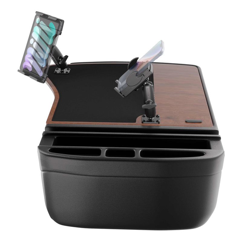 The AutoExec GripMaster Efficiency Car Desk, equipped with Mega Grip™ and Slim-Grip® Ultra Pro Drill-Base Mounts, functions as a versatile tablet holder and smartphone stand. It features a stylish wood and black surface along with built-in storage compartments, providing a convenient all-in-one car desk solution.