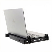 A silver MacBook laptop sitting open on an Arkon Mounts Heavy-Duty Laptop Holder with Optional Cooling Fan, isolated on a white background.