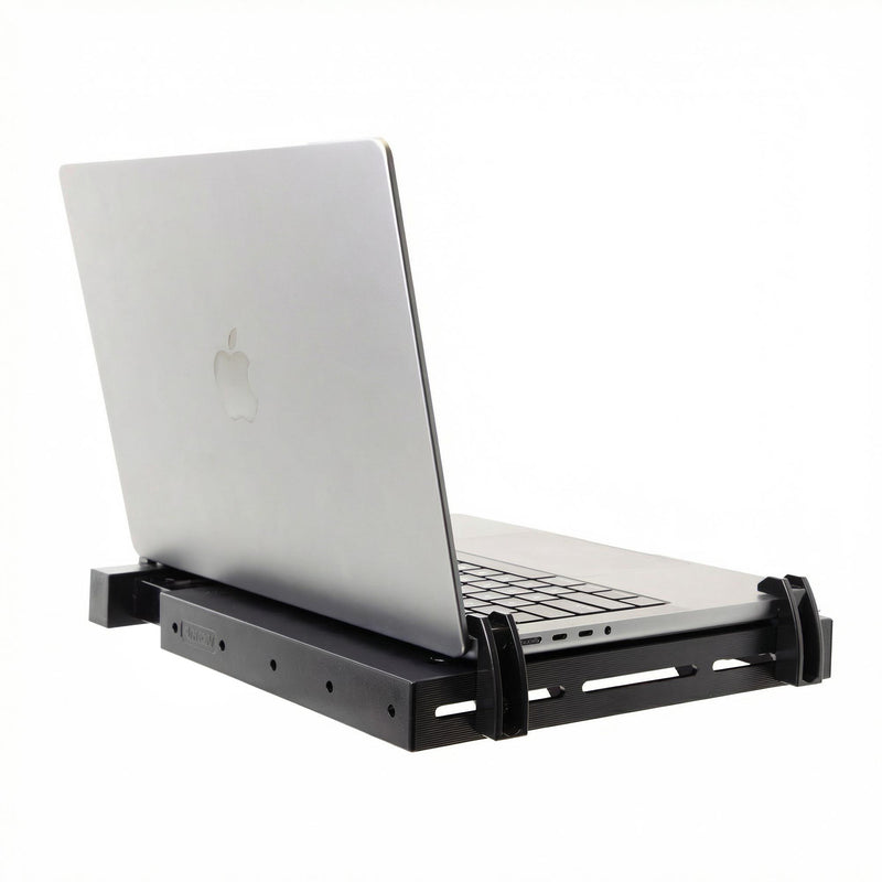 A silver MacBook laptop sitting open on an Arkon Mounts Heavy-Duty Laptop Holder with Optional Cooling Fan, isolated on a white background.