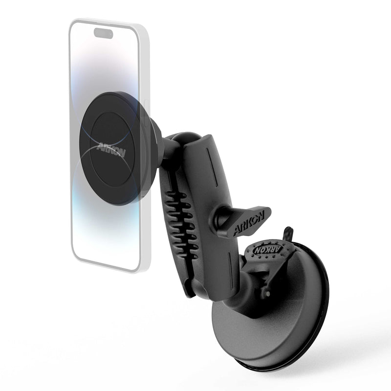 The Magnetic Phone Holder with Suction Mount - MagSafe Compatible securely holds your smartphone vertically in your car, featuring an adjustable arm and a circular magnetic holder for easy attachment.
