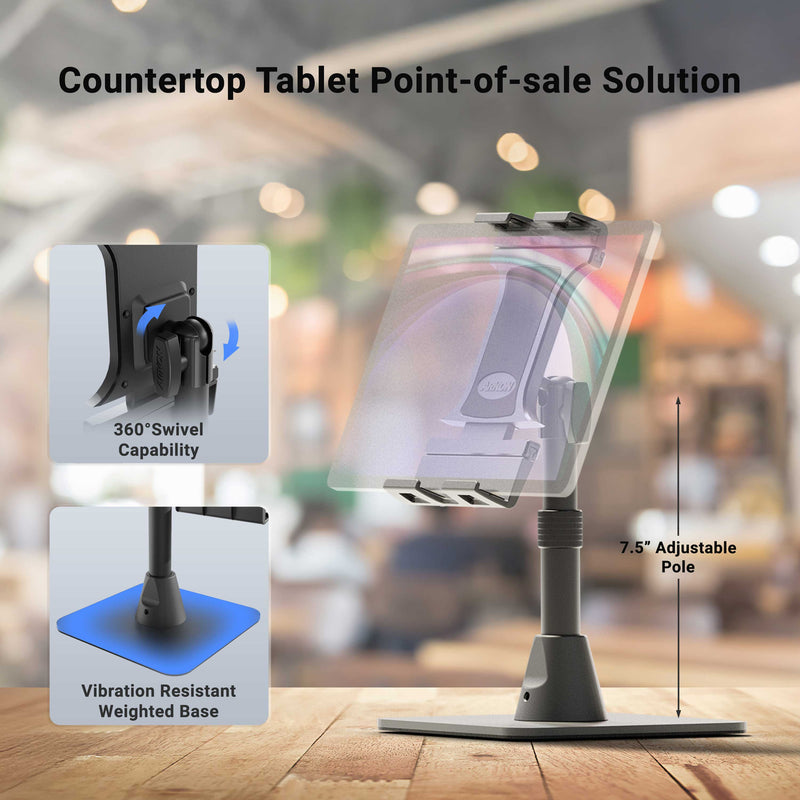 The Slim-Grip® Ultra Pro POS Tablet Stand, featuring a 360° swivel, vibration-resistant weighted base, and 7.5″ adjustable pole, is showcased in a blurred café environment. This countertop POS Tablet Stand is specifically designed for efficient use in retail and restaurant settings, with inset images highlighting the main features of the Retail and Restaurant Tablet Holder.