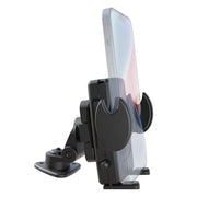 The Mega Grip™ Holder with Adhesive Mount securely holds a smartphone vertically, featuring a black adjustable design attached to a swiveling base for stable mounting on flat surfaces. This universal phone holder uses an adhesive car mount for reliable stability wherever you place it.