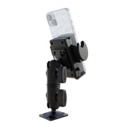 A smartphone mounted on the Mega Grip™ Phone Drill Base Mount with Double Socket Swivel Arm, featuring a black adjustable holder and sturdy base designed for secure positioning on flat surfaces.