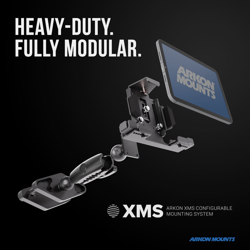 Exploded view of the XMS™ Heavy Duty Forklift Mount with LockVise™ Metal Locking Tablet Holder, displaying its modular components separated, with text HEAVY-DUTY. FULLY MODULAR. and XMS Arkon XMS Configurable Mounting System on a black background—a perfect illustration of an industrial tablet mounting system engineered for demanding environments such as forklift tablet mount applications.