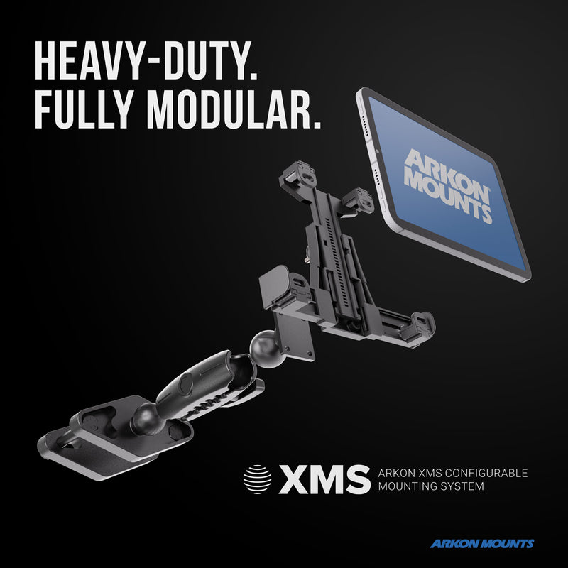 Exploded view of the XMS™ Heavy Duty Forklift Mount with LockVise™ Locking Tablet Holder, engineered as the ultimate warehouse tablet mounting solution. Features a robust locking tablet holder, with the text HEAVY-DUTY. FULLY MODULAR., and a tablet screen displaying ARKON MOUNTS. The XMS™ logo and product description appear at the bottom.