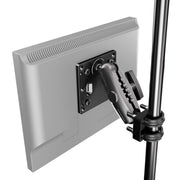 A close-up of an XMS™ U-Bolt Mount with VESA Mount attached to a vertical pole, showing the monitor’s mounting bracket and tightening knobs.