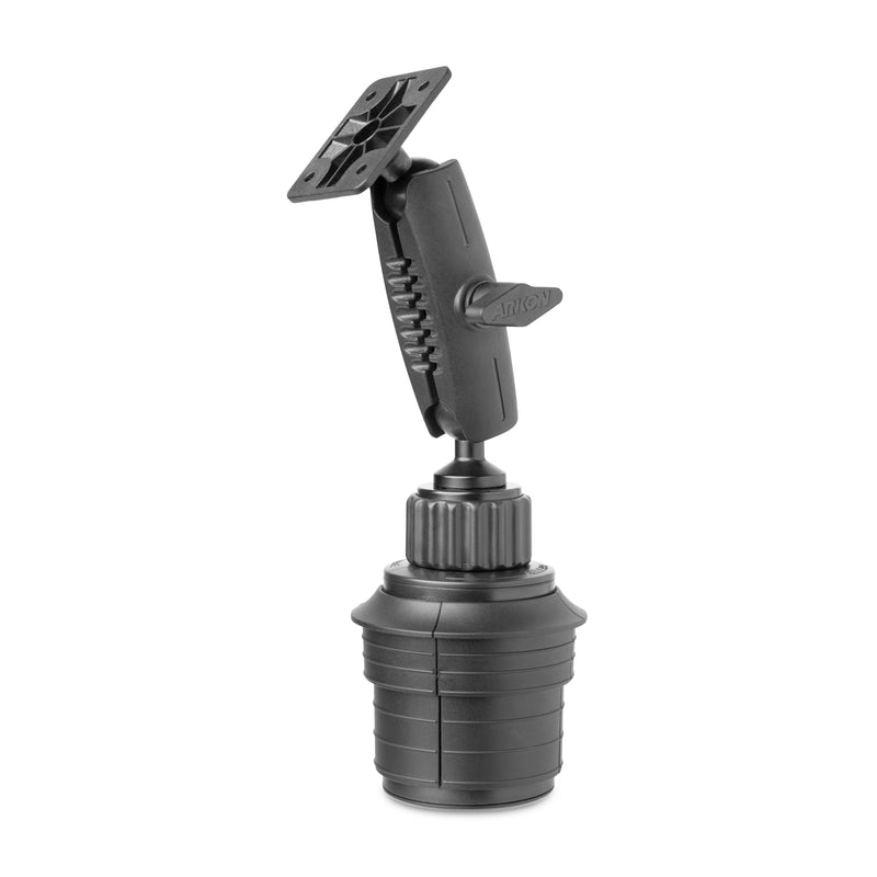 The AMPS Mounting Pattern with Cup Holder Mount is a black, adjustable car mount featuring a ribbed cylindrical base, pivoting arm, and flat rectangular top plate for securely holding electronic devices or accessories.