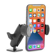 A smartphone is mounted in the RoadVise® Phone Holder with Drill-Base Mount, which features a black adjustable design and a square base with an AMPS pattern, displaying colorful app icons on its screen.