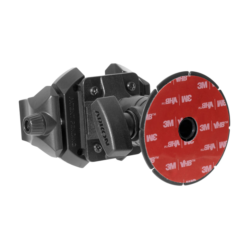 The RoadVise® Ultra Phone and Tablet Holder with Adhesive Base and 2” Shaft Arm features a black adjustable bracket and round red “3M VHB” adhesive pad for secure phone or tablet mounting.