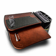 The AutoExec GripMaster Car Desk with Mega Grip™ Drill-Base Mount serves as a mobile office workstation, featuring a built-in phone holder with a Mega Grip mount, clipboard, and side compartment for files—all displayed on a white background.