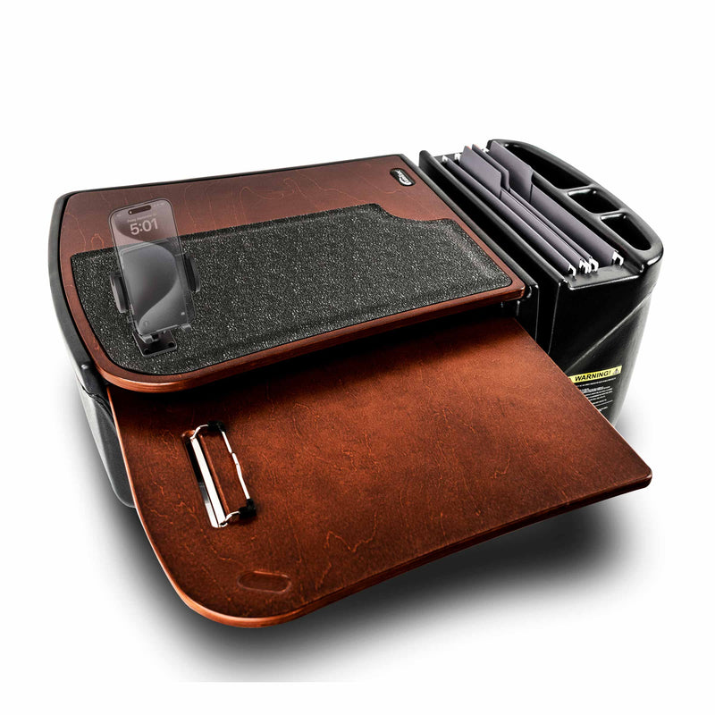 The AutoExec GripMaster Car Desk with Mega Grip™ Drill-Base Mount serves as a mobile office workstation, featuring a built-in phone holder with a Mega Grip mount, clipboard, and side compartment for files—all displayed on a white background.