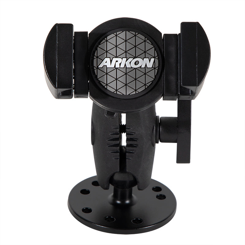 The black RoadVise® XL Holder with a circular drill-base mount features adjustable arms for secure phone mounting on flat surfaces. The Arkon logo appears on the front.