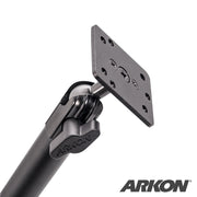 A close-up of the XMS 20mm AMPS Adapter Plate showcases its adjustable aluminum mounting plate with the AMPS pattern and multiple screw holes, set against a white background with the Arkon logo in the corner.