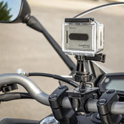 The Bike or Motorcycle GoPro Handlebar Mount for GoPro HERO Action Cameras attaches securely to handlebars, capturing immersive rider-perspective footage with a blurred background that highlights the mount and bike controls.