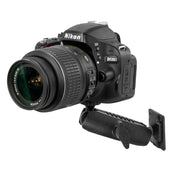 A Nikon D5100 DSLR with lens is secured to a black Camera Wall Mount for Nikon, Sony, Canon, Fujifilm, and Olympus cameras and video cameras.