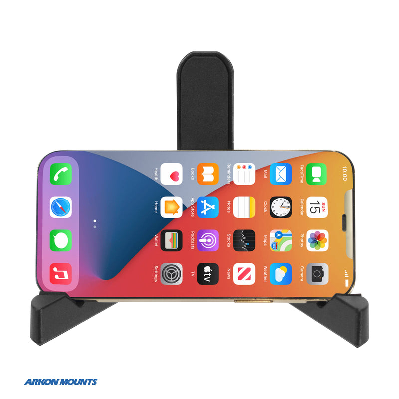 A smartphone with a colorful home screen is held horizontally in a black Portable Tablet & Phone Stand. The Arkon Mounts logo appears in blue in the bottom left corner.